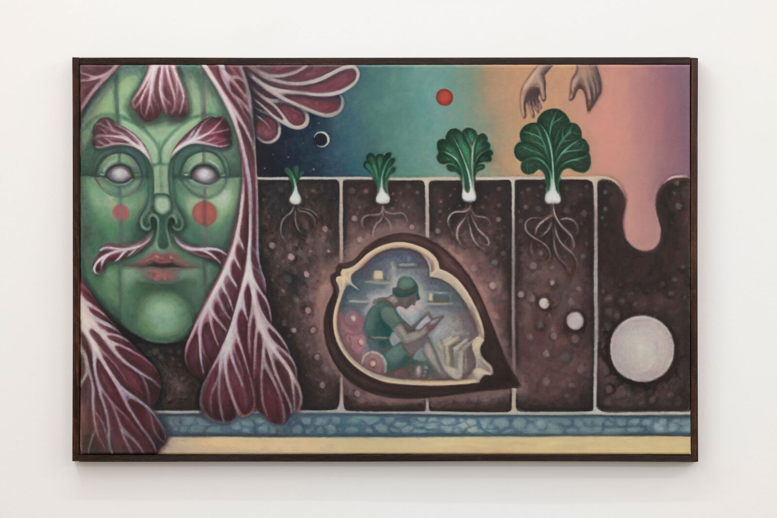 A painting with a face looking out, patterned with cabbage like leaves and a cross section of soil with a person in a nut shaped hole in the ground