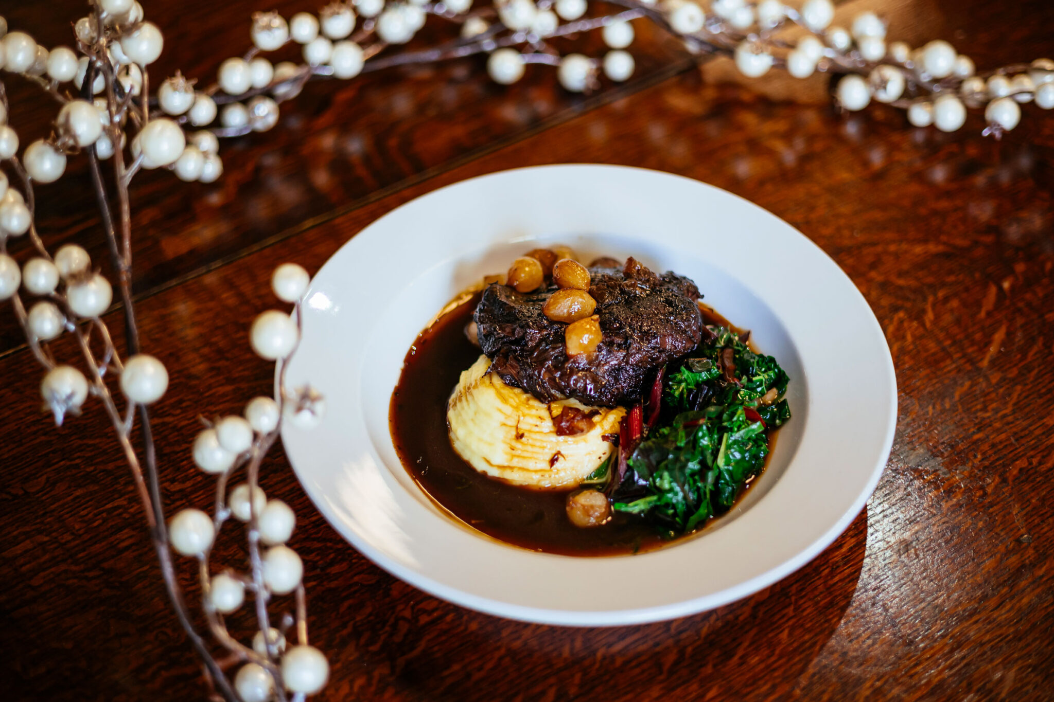 Braised ox cheek with mash potato and greens