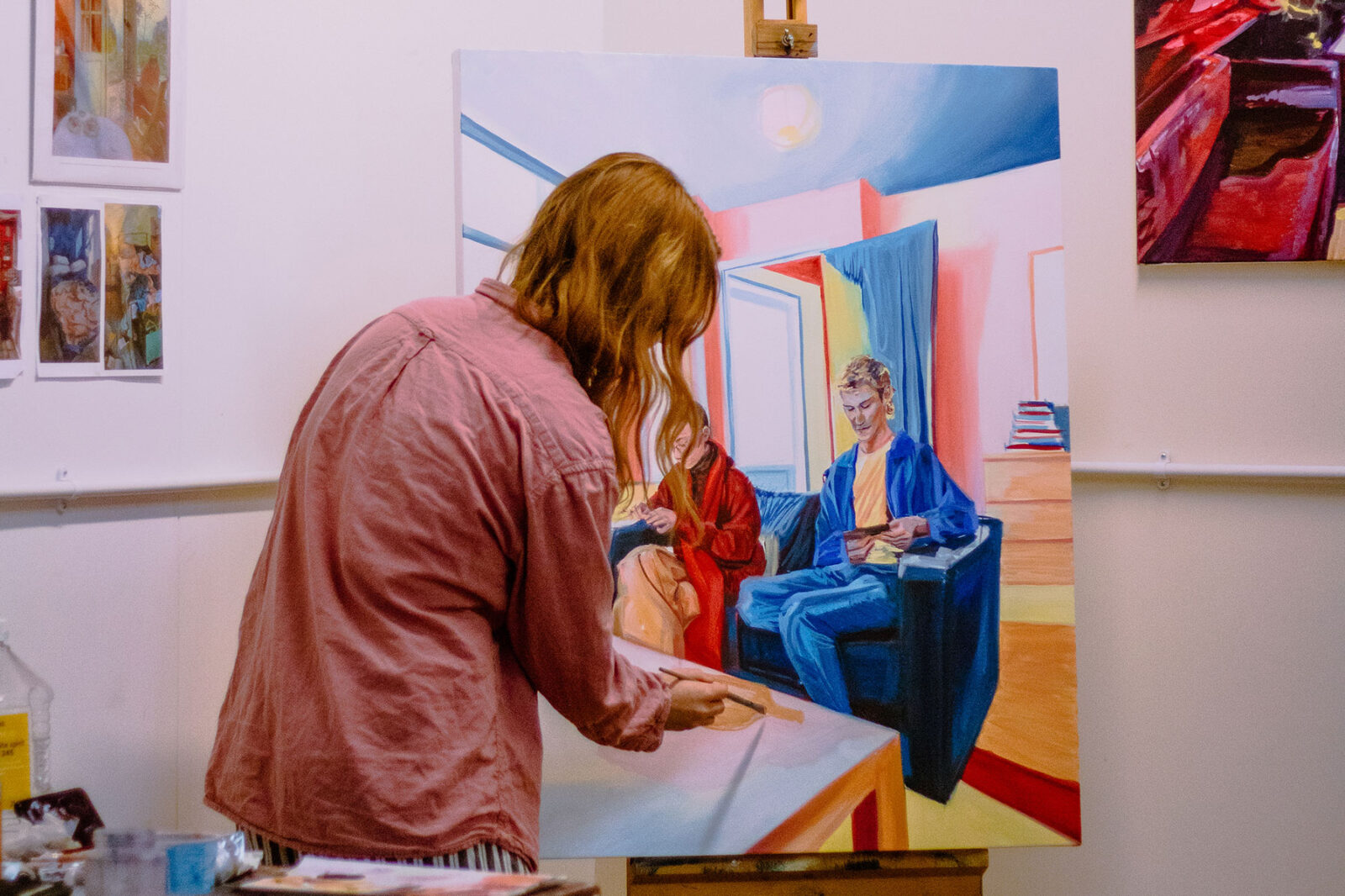 Artist Julia Pomeroy paints a brightly coloured portrait
