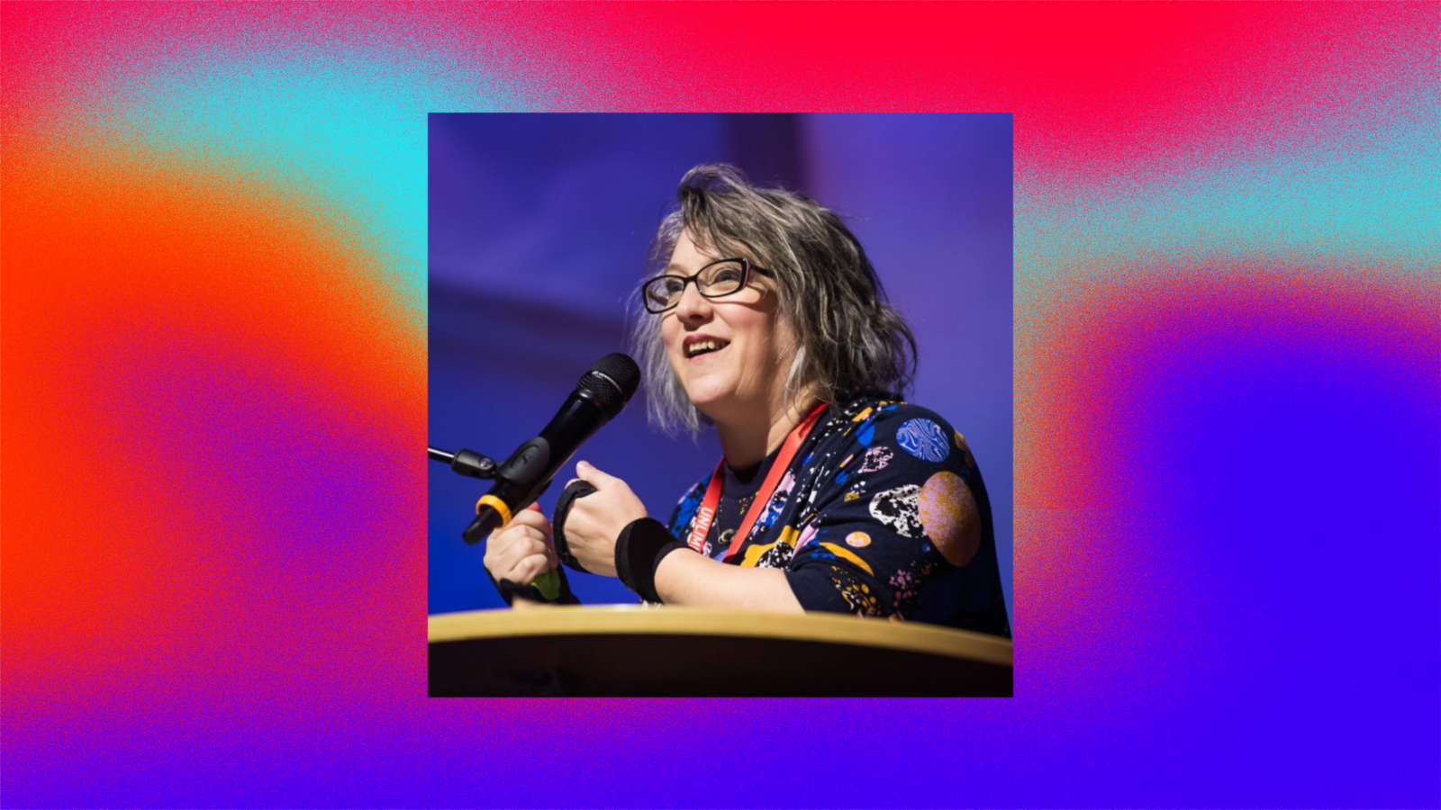 A photo of Jo Verrent speaking on stage