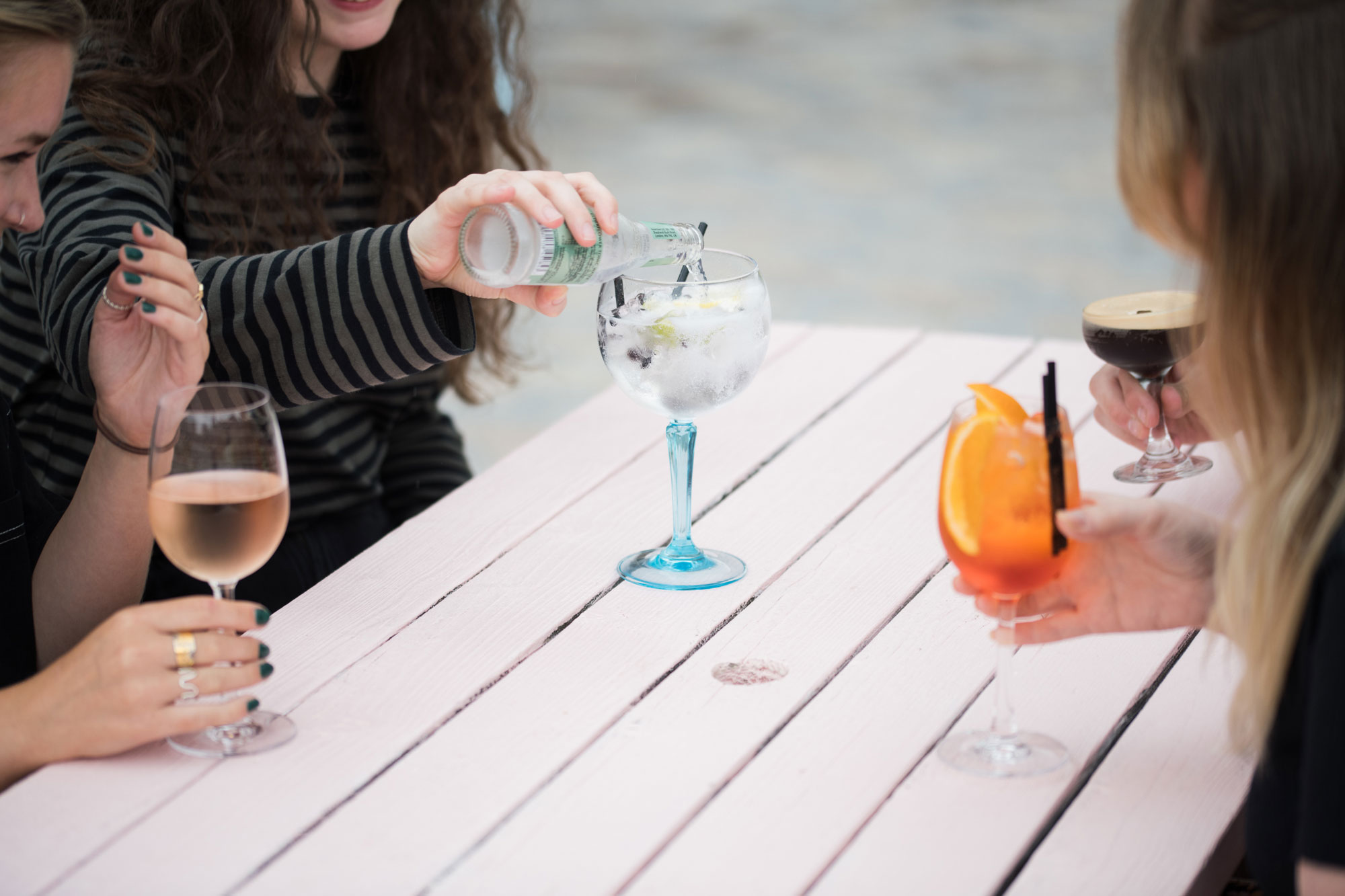 People on a terrace drinking