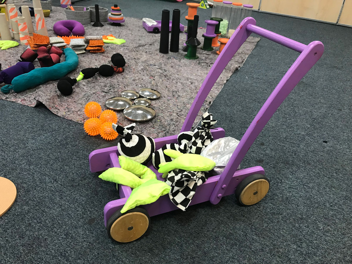 A wooden toy trolley