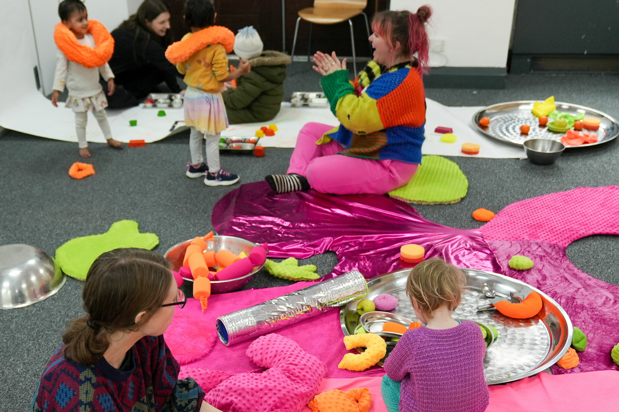 Children playing in a colourful environment